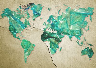 World map in dirty and burned plastic surface on cracked wall. Pollution concept. Elements of this image furnished by NASA.